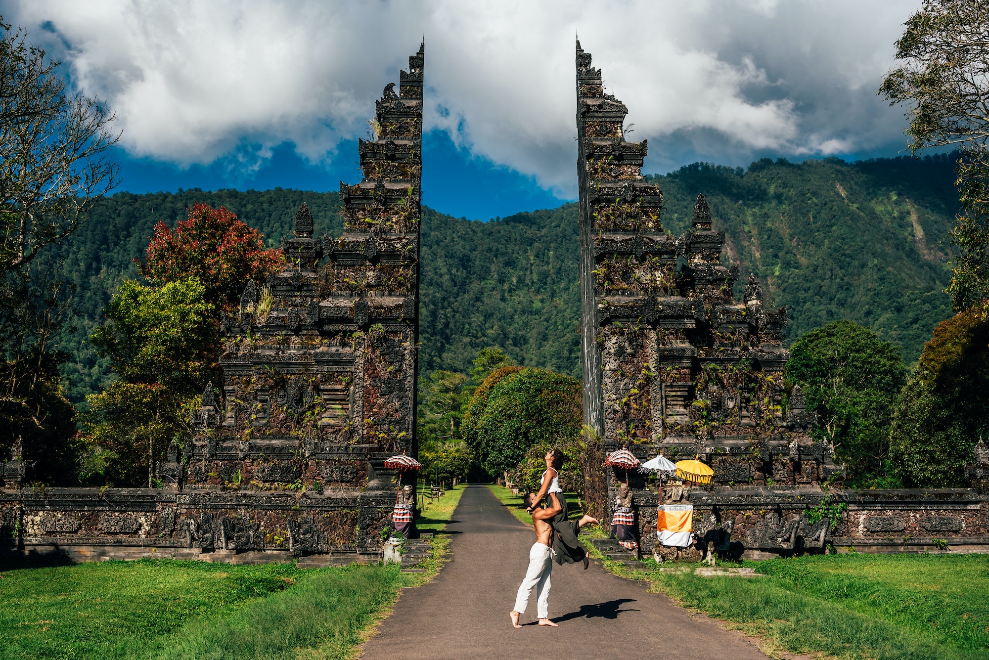 A man and a woman traveling on the island of Bali Indonesia