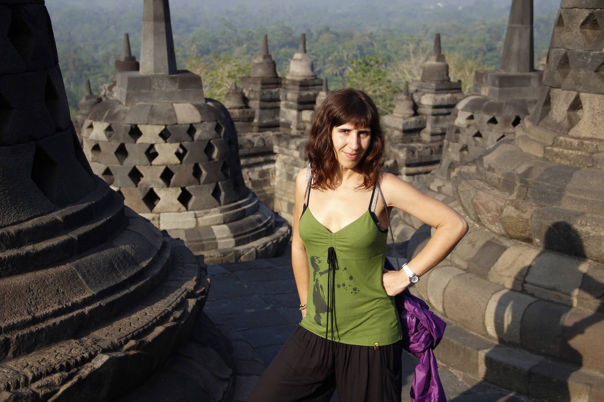 A woman tourist in the Borobudur temple, color photo. Indonesia