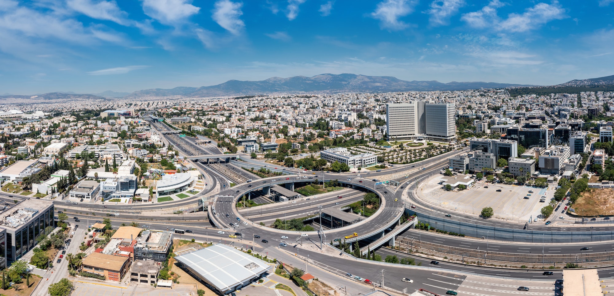 Attiki Odos toll road interchange with Kifisias Avenue, Marousi Athens, Greece. Aerial drone view