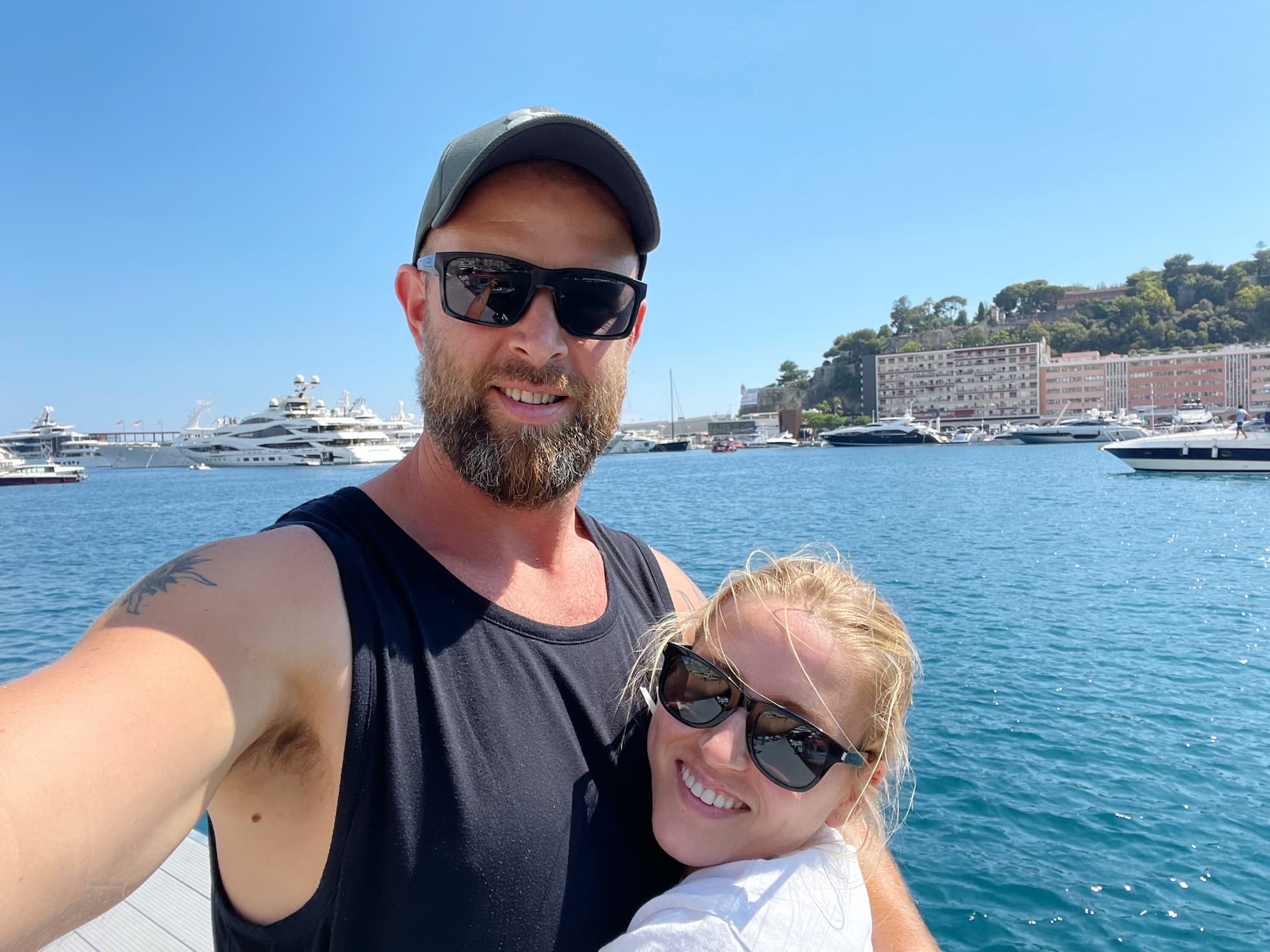 Couple smiling selfie at the Monaco port
