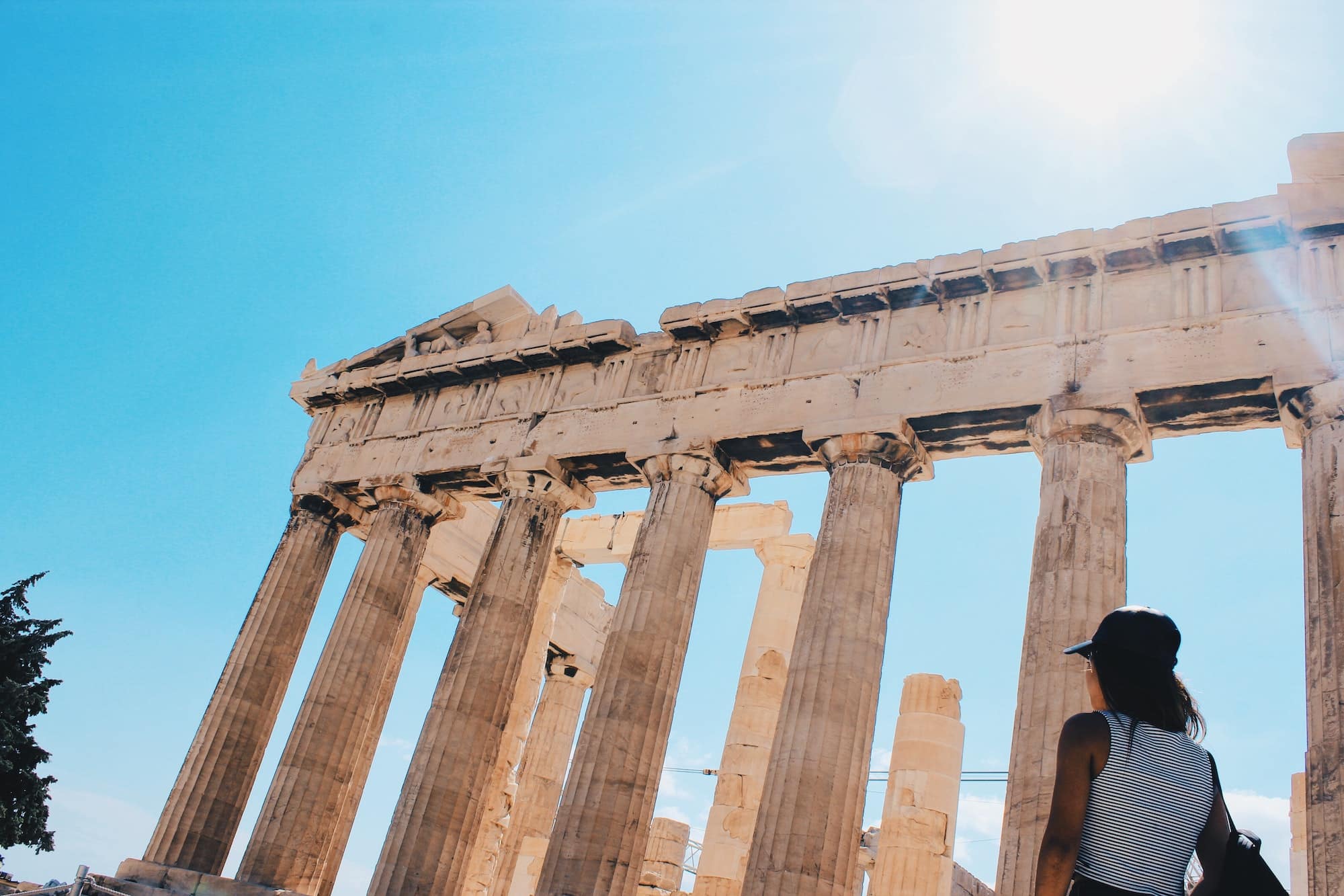 Girl looking at the Acropolis. Athens, Greece.