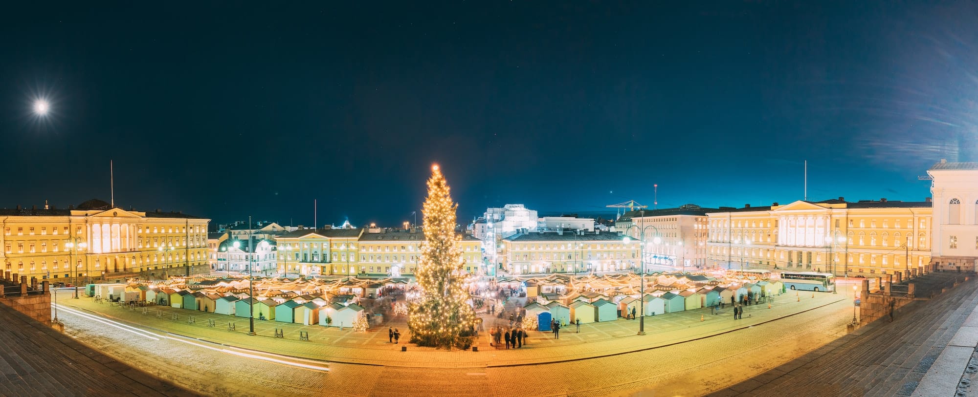 Helsinki, Finland. Christmas Xmas Market With Christmas Tree On Senate Square In Evening Night