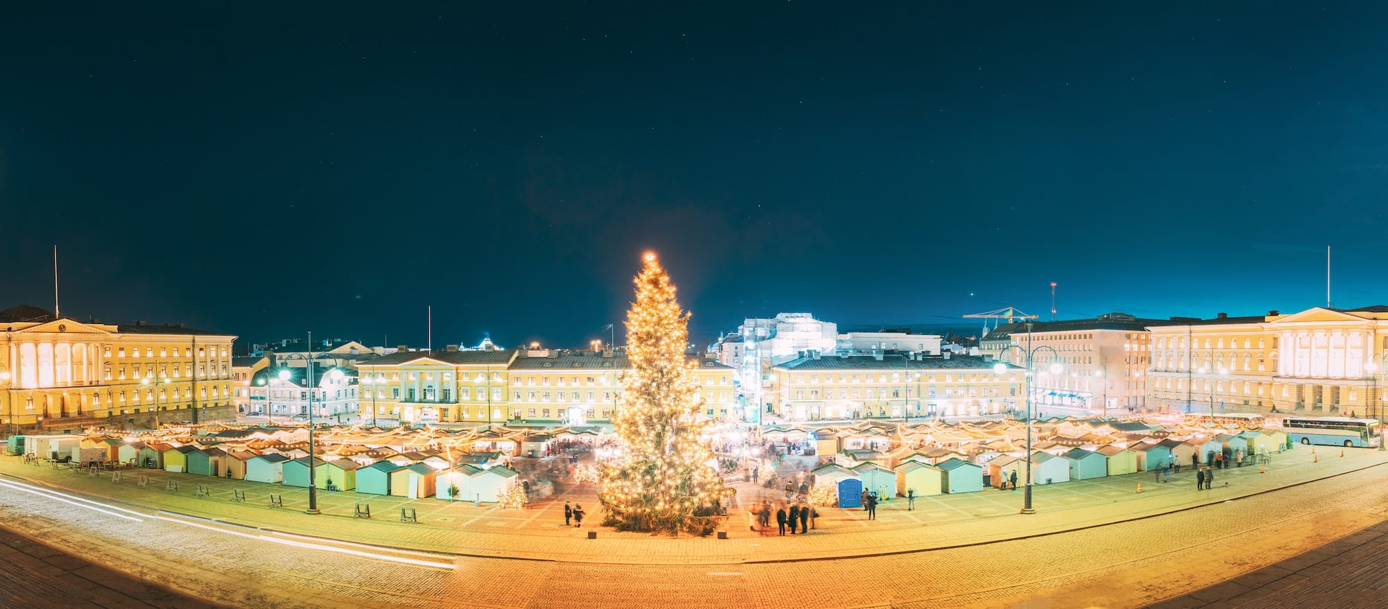 Helsinki, Finland. Christmas Xmas Market With Christmas Tree On Senate Square In Evening Night