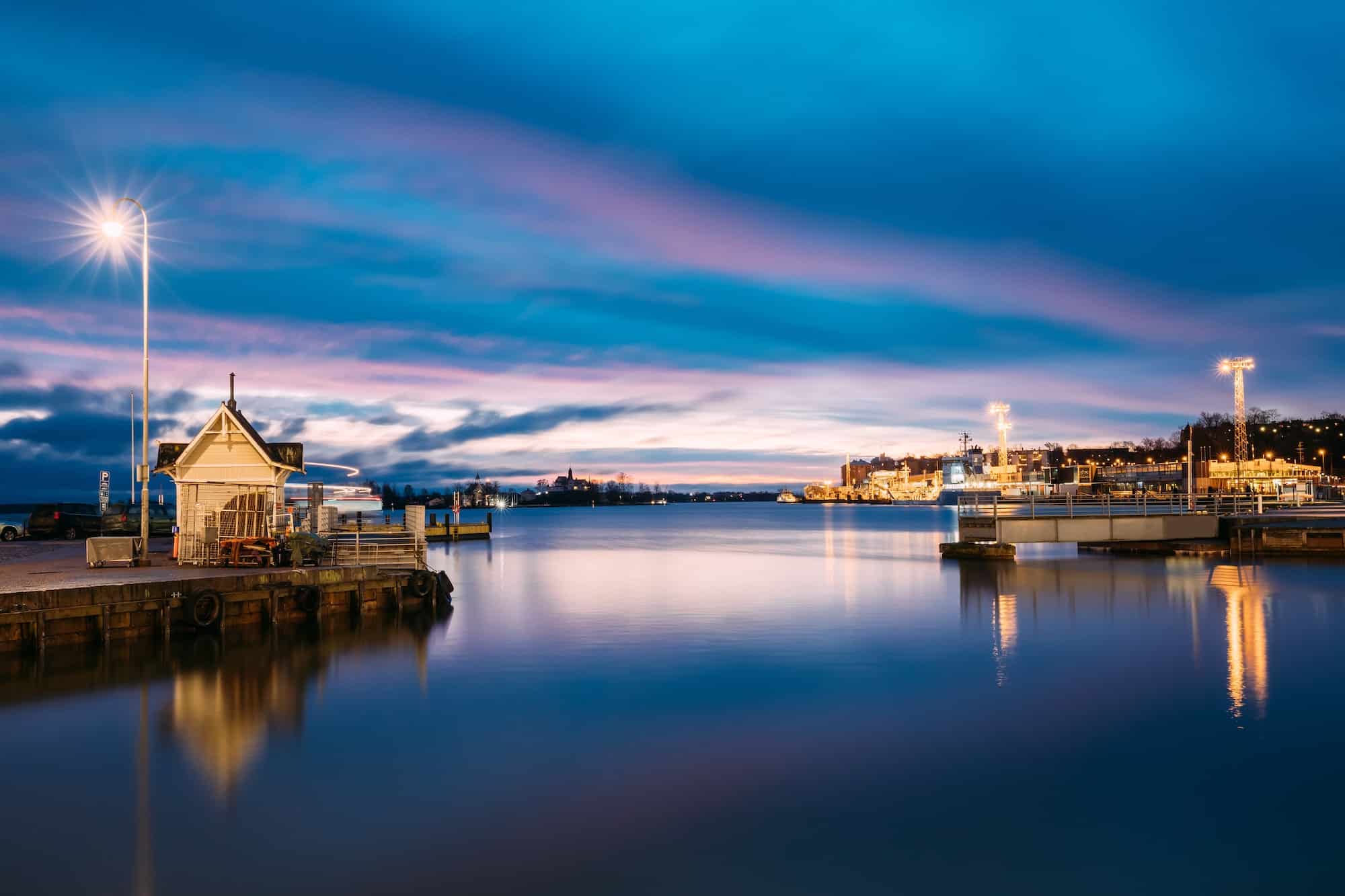 Helsinki, Finland. Landscape With City Pier, Jetty At Winter Sun