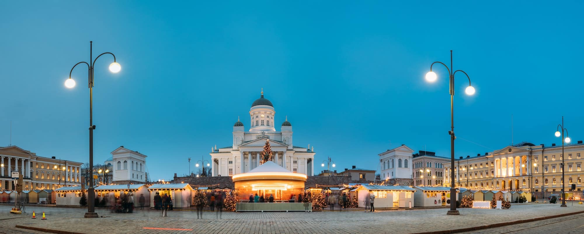 Helsinki, Finland. Market On Senate Square With Holiday Carousel