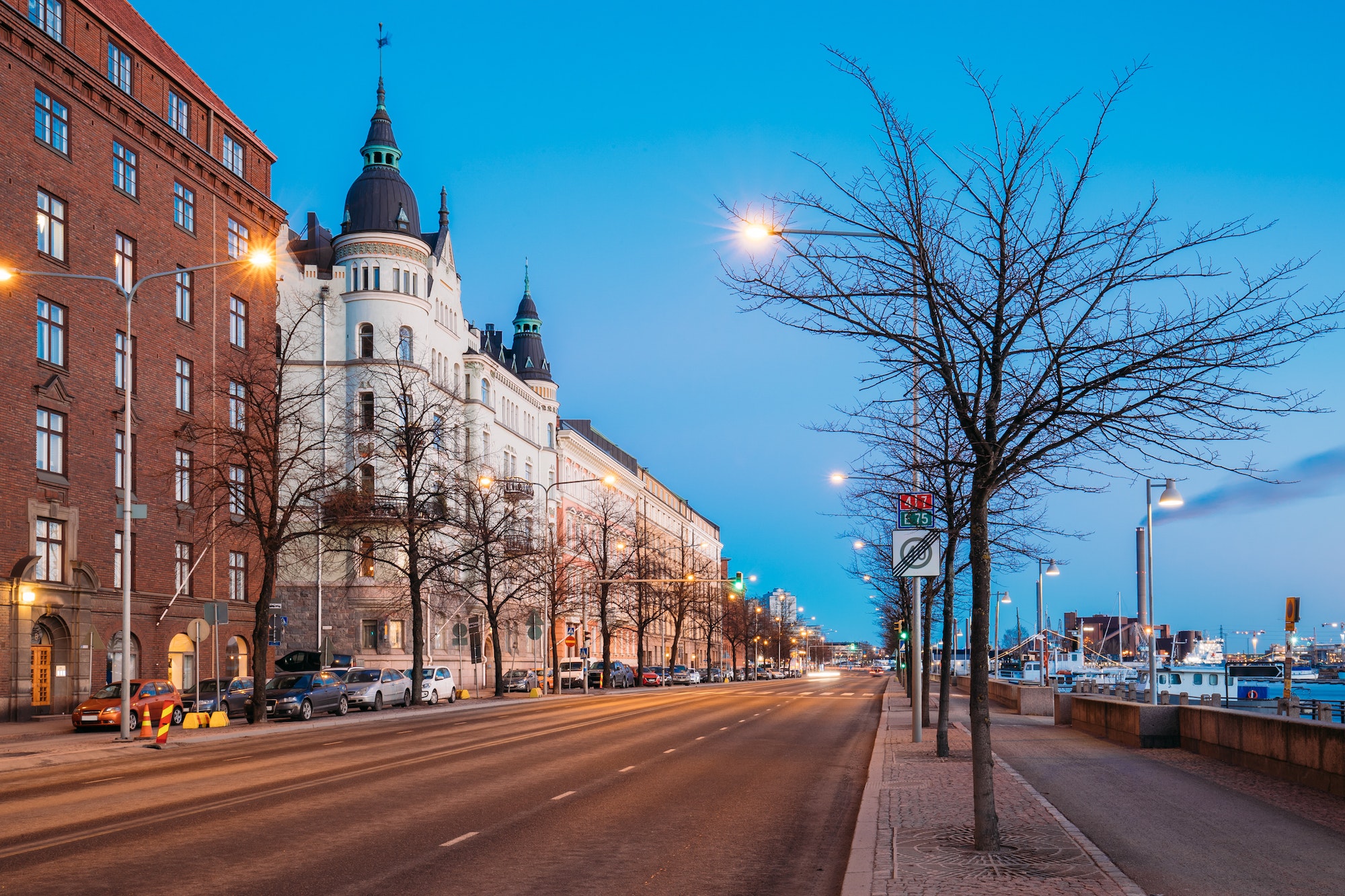 Helsinki, Finland. Night Traffic In Pohjoisranta Street In Night