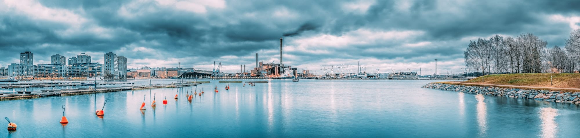 Helsinki, Finland. Panoramic Evening View Of Houses In Merihaka