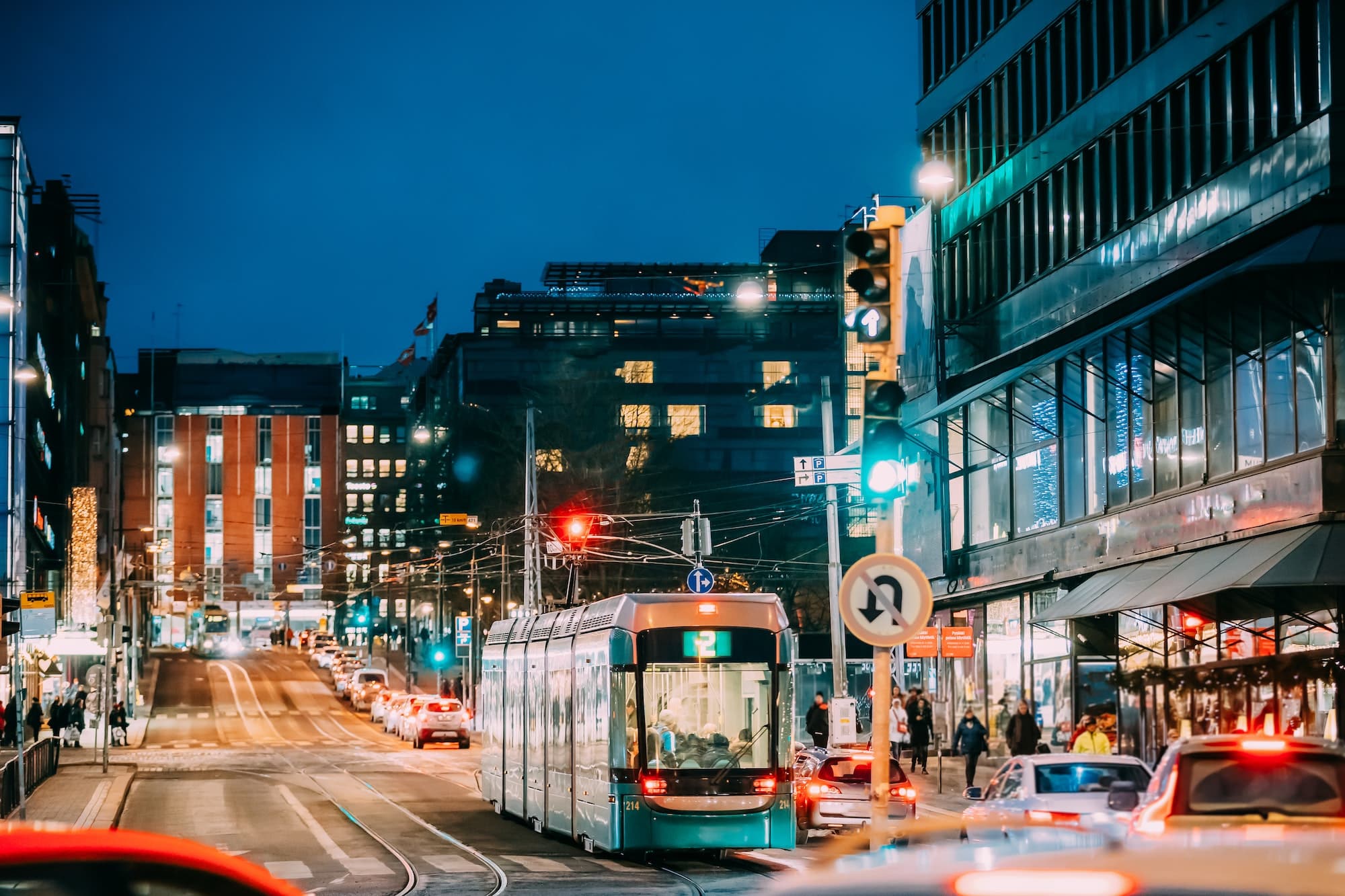 Helsinki, Finland. Tram Departs From A Stop On Kaivokatu Street
