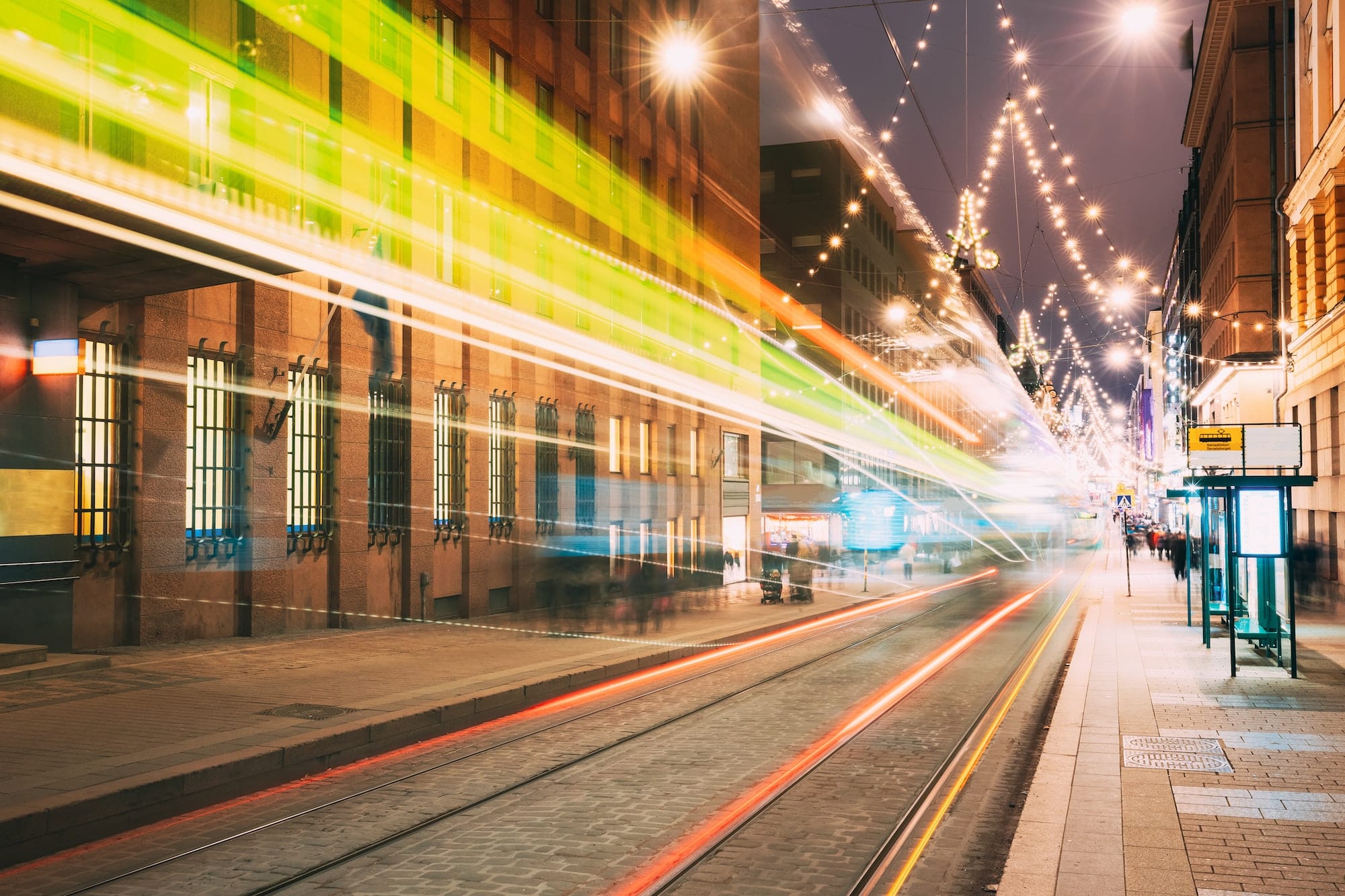 Helsinki, Finland. Tram Departs In Motion Blur From Stop On Alek