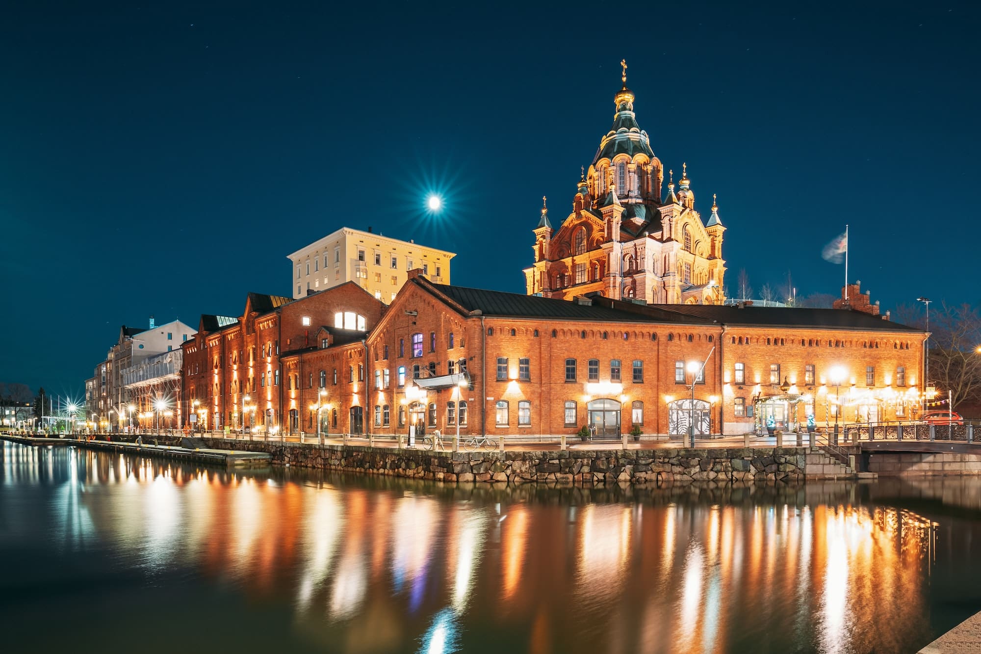 Helsinki, Finland. View Of Kanavaranta Street With Uspenski Cathedral In Evening Night Illuminations
