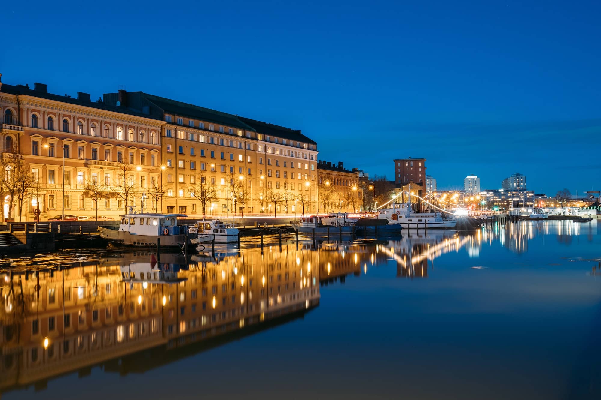 Helsinki, Finland. View Of Pier With Boats And Pohjoisranta Stre