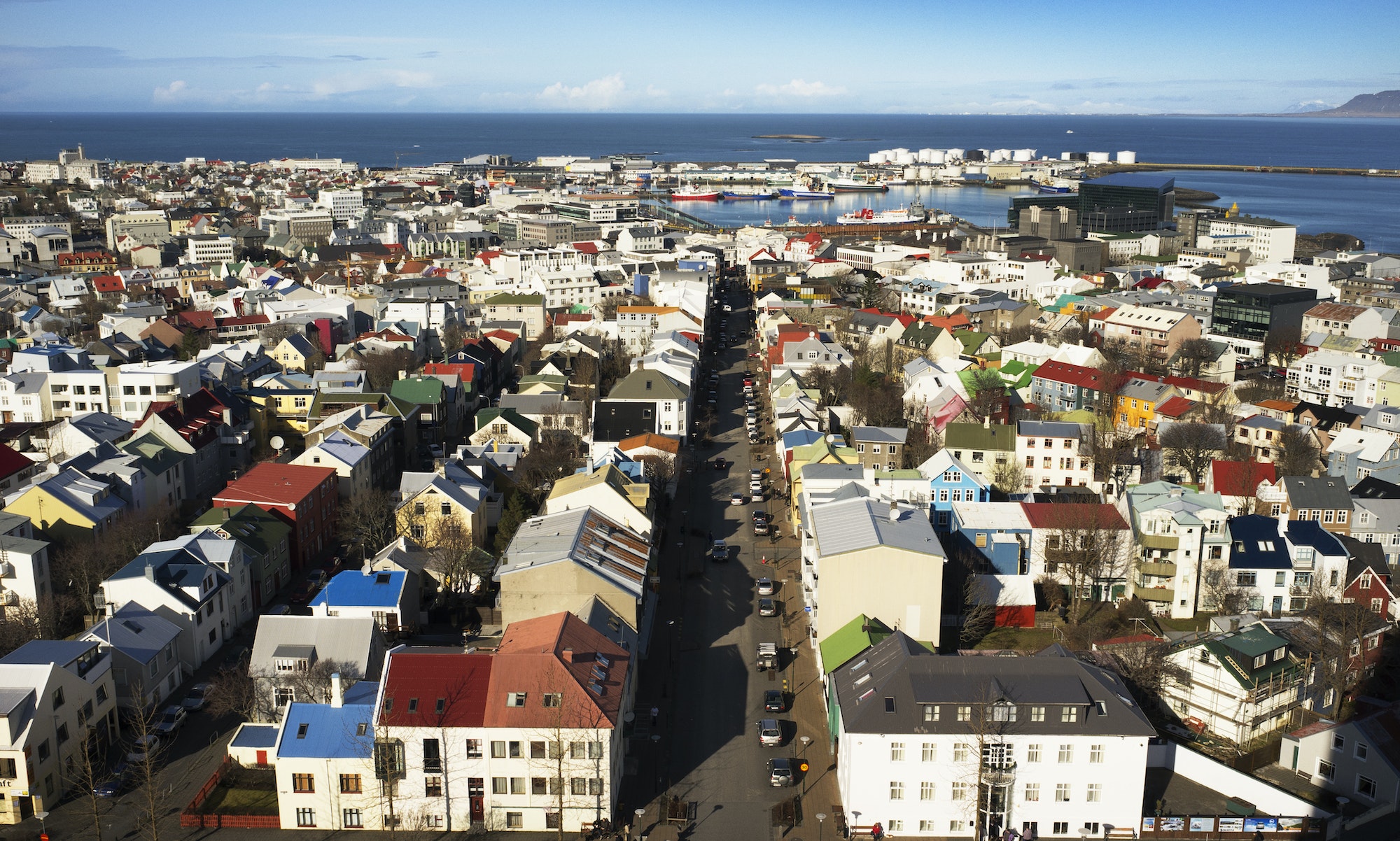 High Angle View Of Buildings In City Against Sea