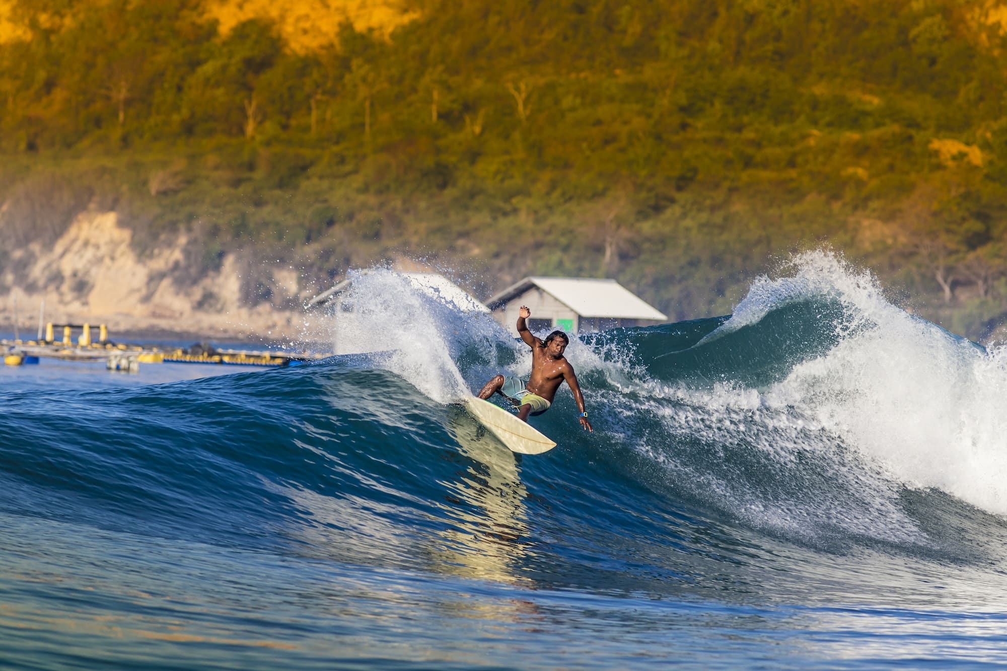 Indonesia, Lombok, surfing man