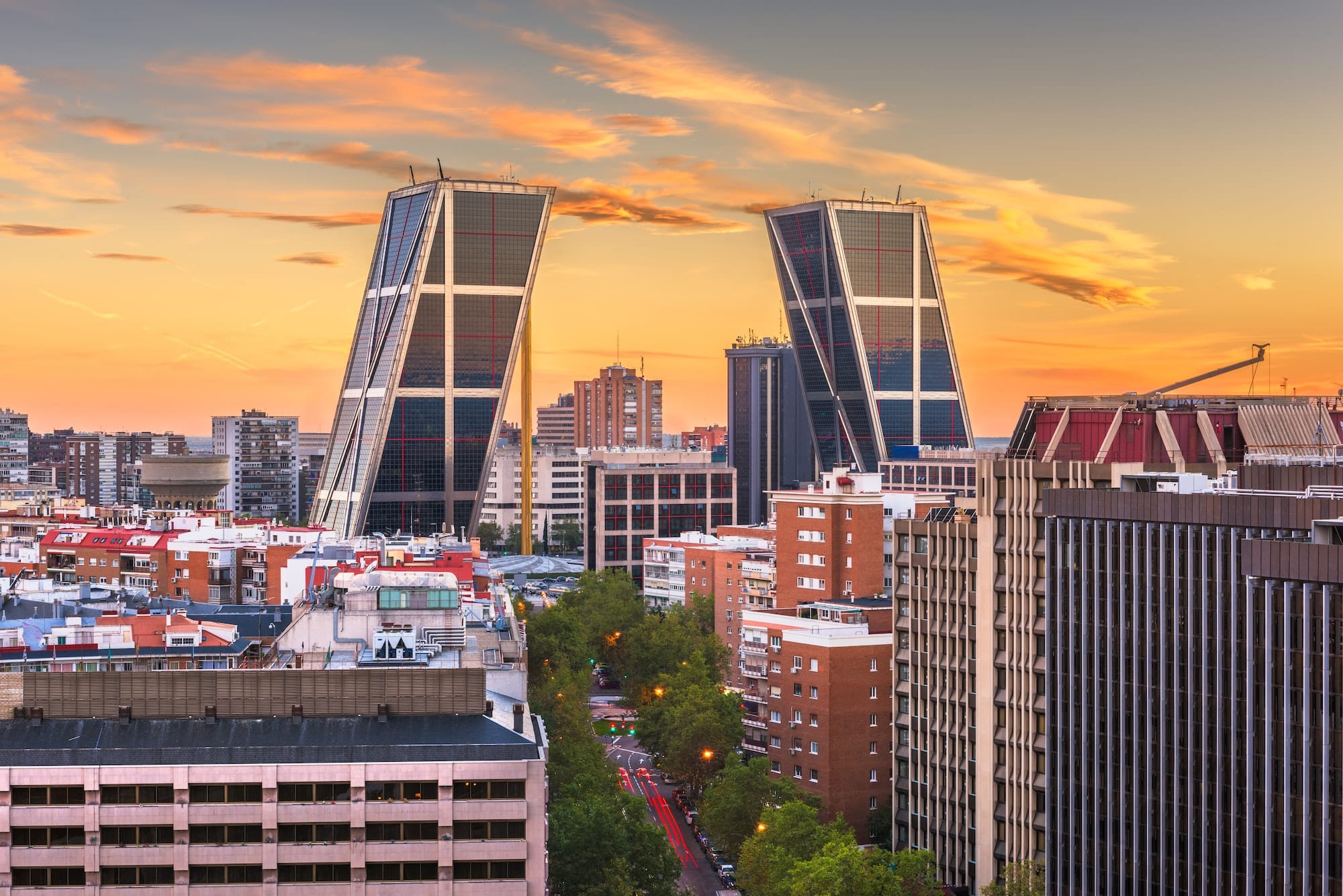 Madrid, Spain financial district skyline at dusk.