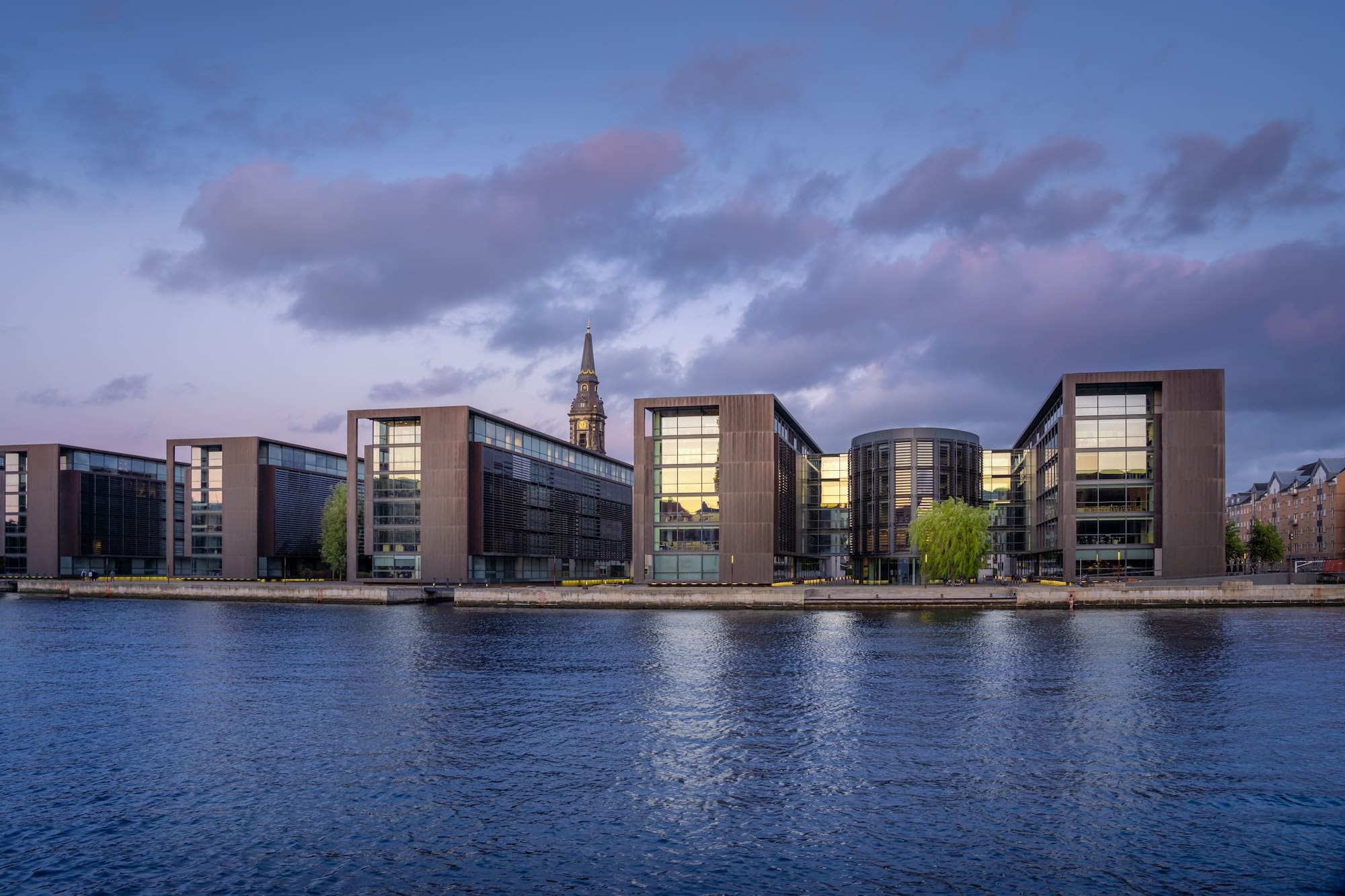 Main Canal view of Christianshavn at sunset with Christians Church Tower - Copenhagen, Denmark