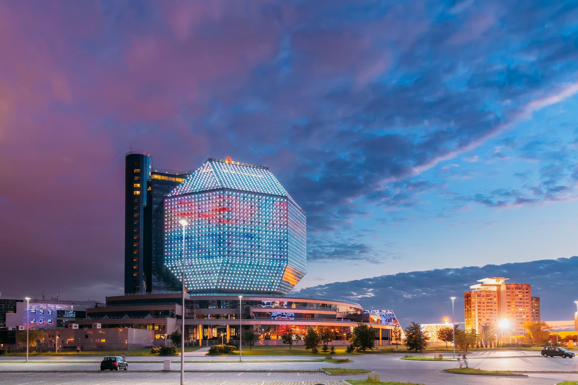 Minsk, Belarus. National Library In Summer Evening Sunset Time. Famous Landmark
