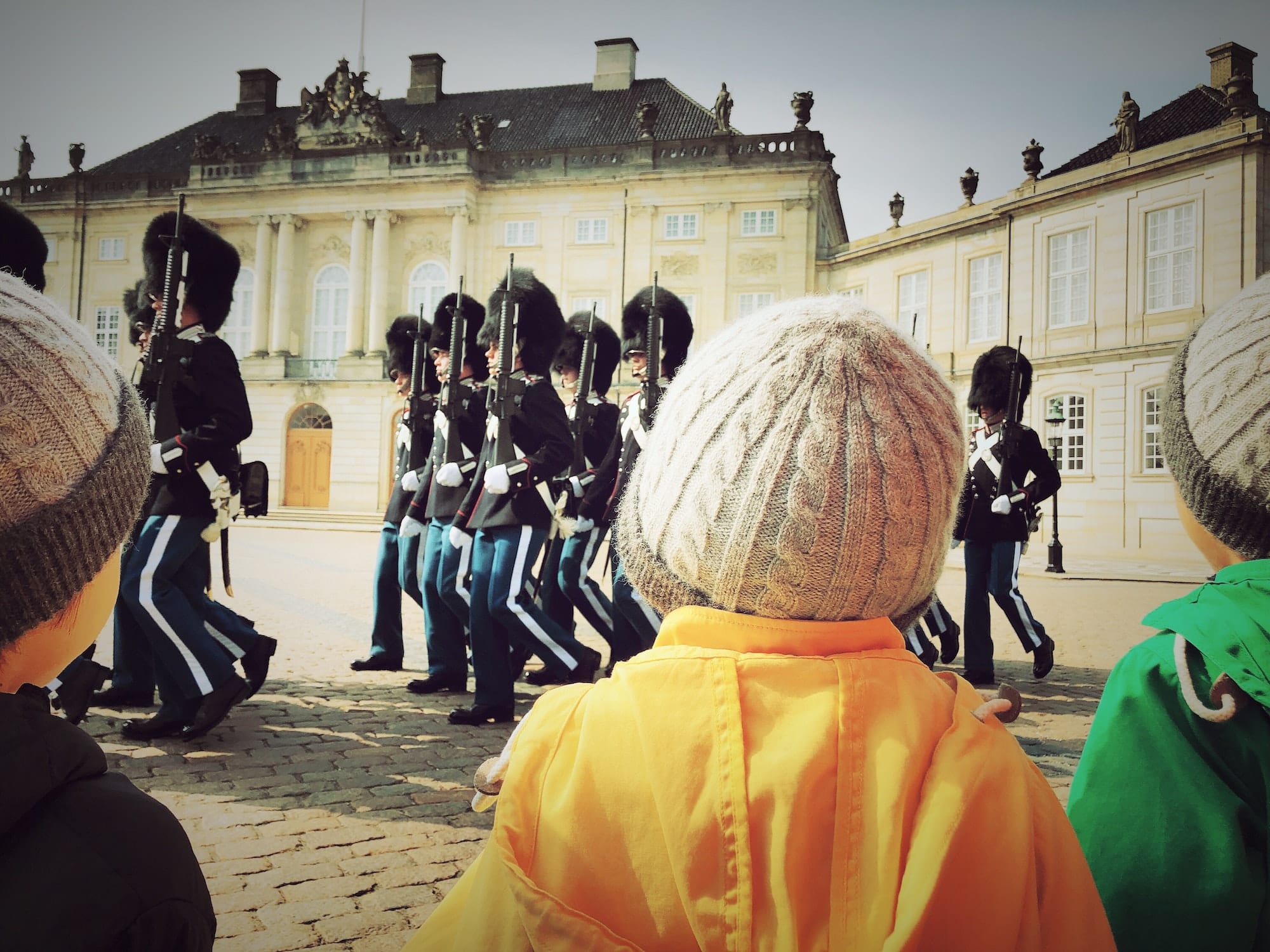 My three boys attentively watching The Royal Life Guards at Amalienborg Palace in Copenhagen