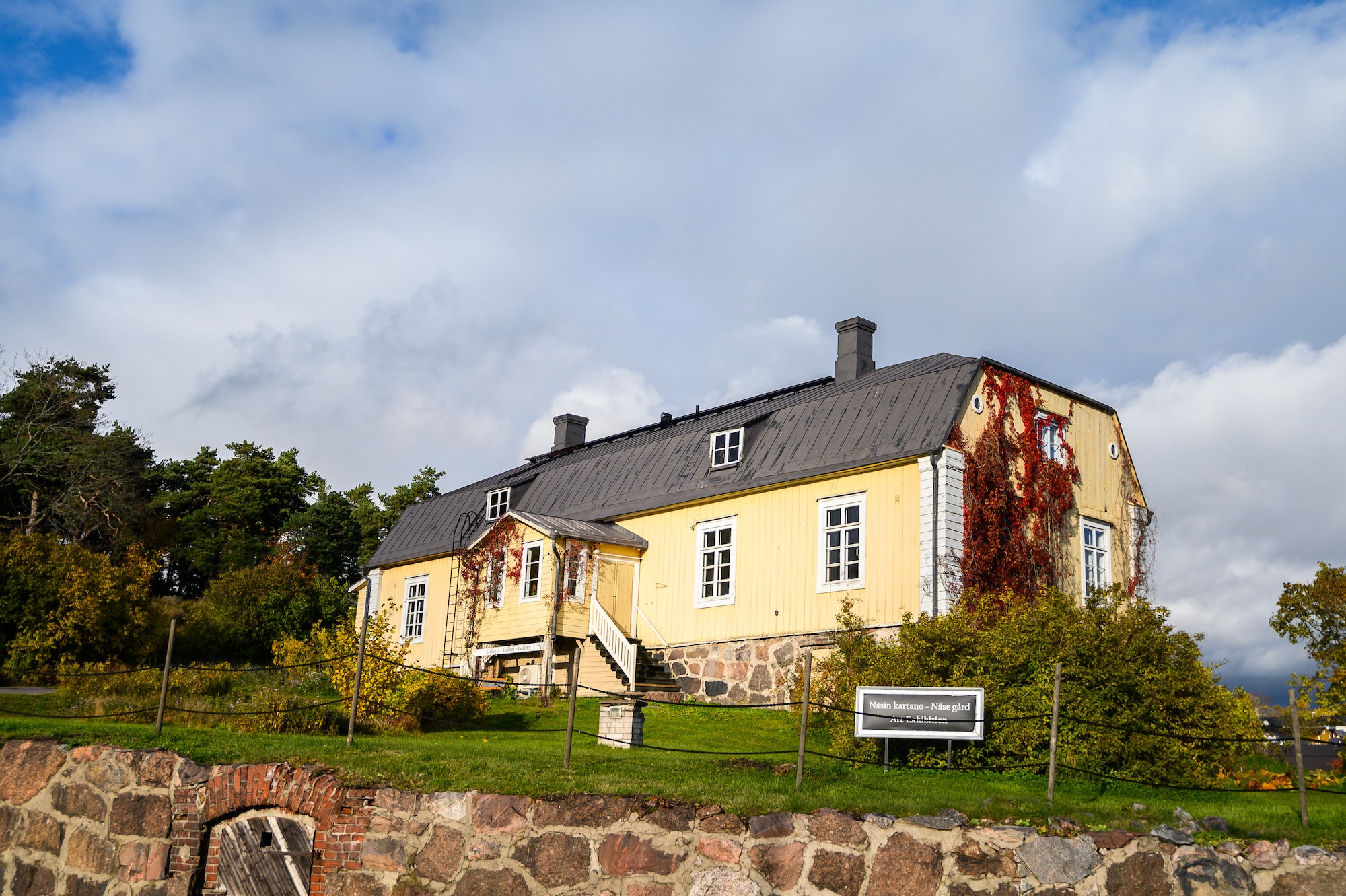 Old House with nice garden in autumn. Suburb of Helsinki, Finland.