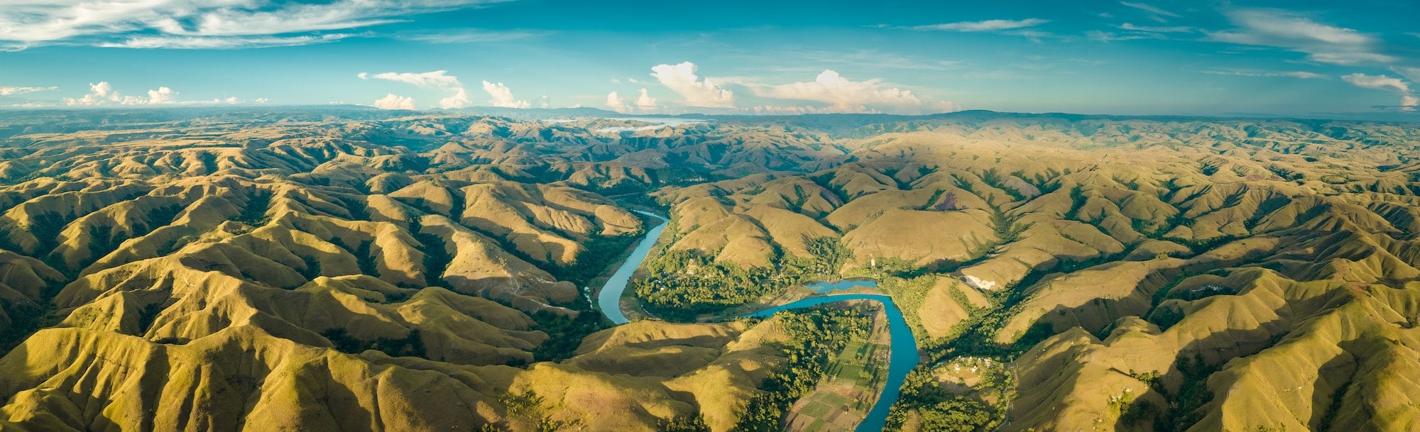 Panorama river, hill. Aerial drone shot. Indonesia