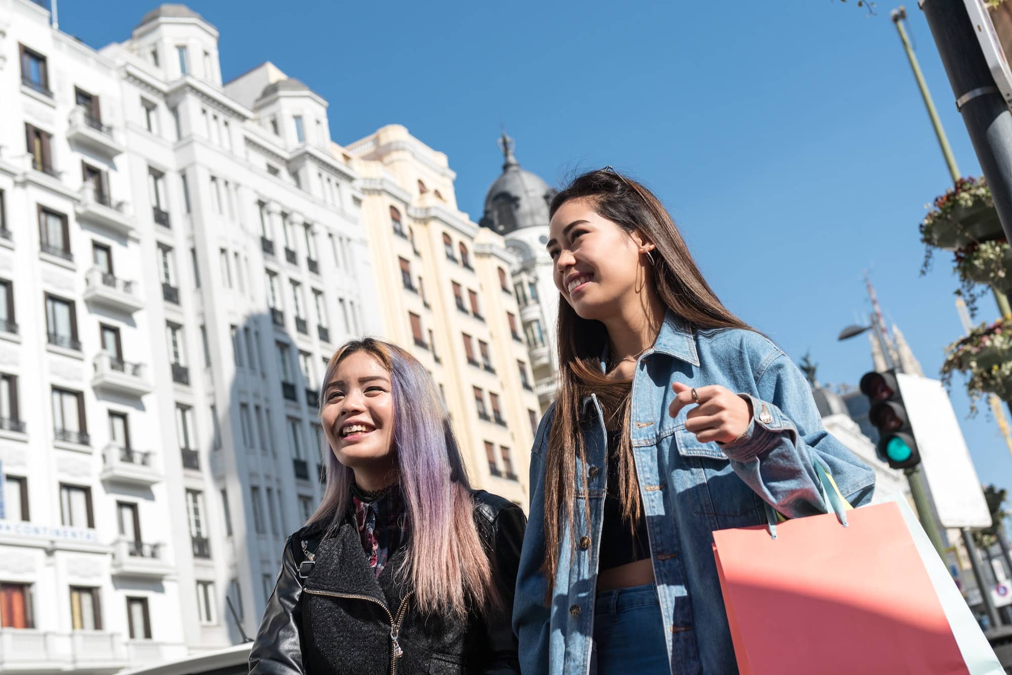Philipinne friends women shopping in Madrid
