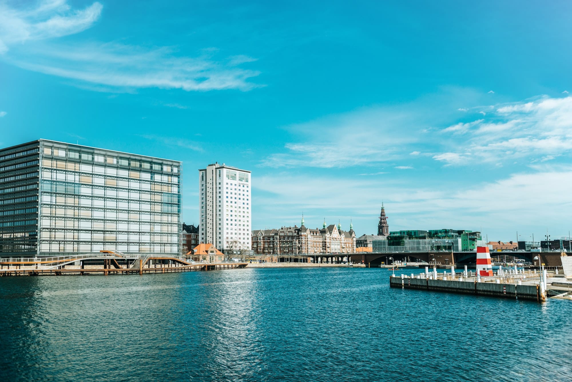 scenic view of city river and architecture of copenhagen, denmark