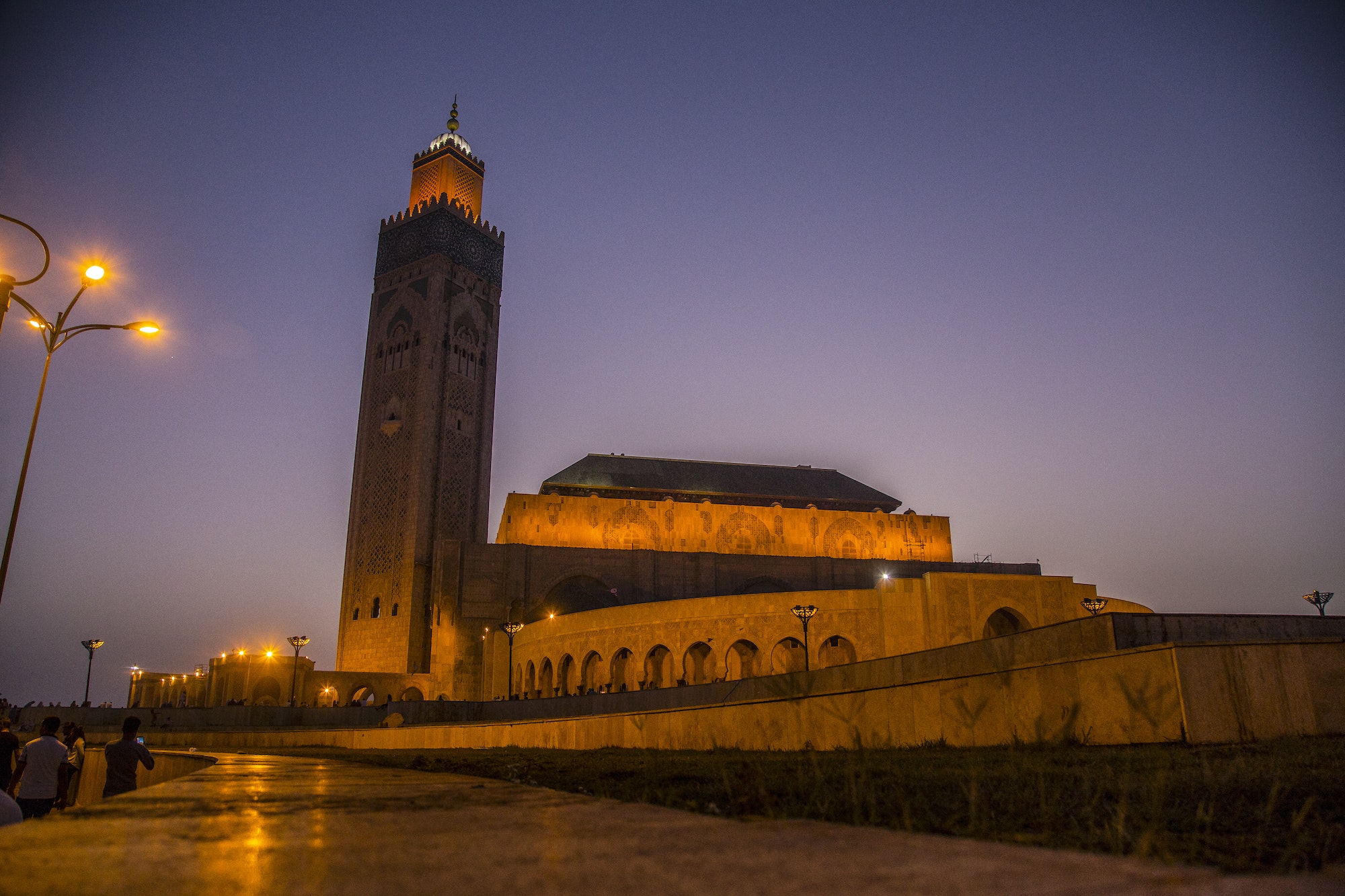 Sunset with the illuminated mosque in Hassan II Mosque of Casablanca. Morocco
