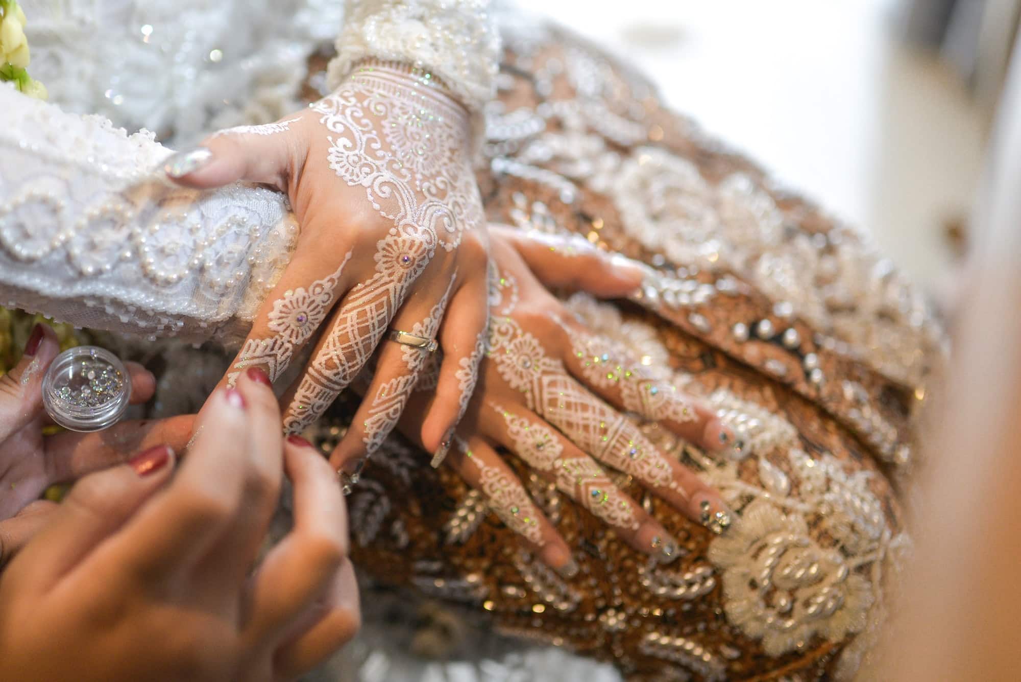 Traditional Indonesian bride hands painting