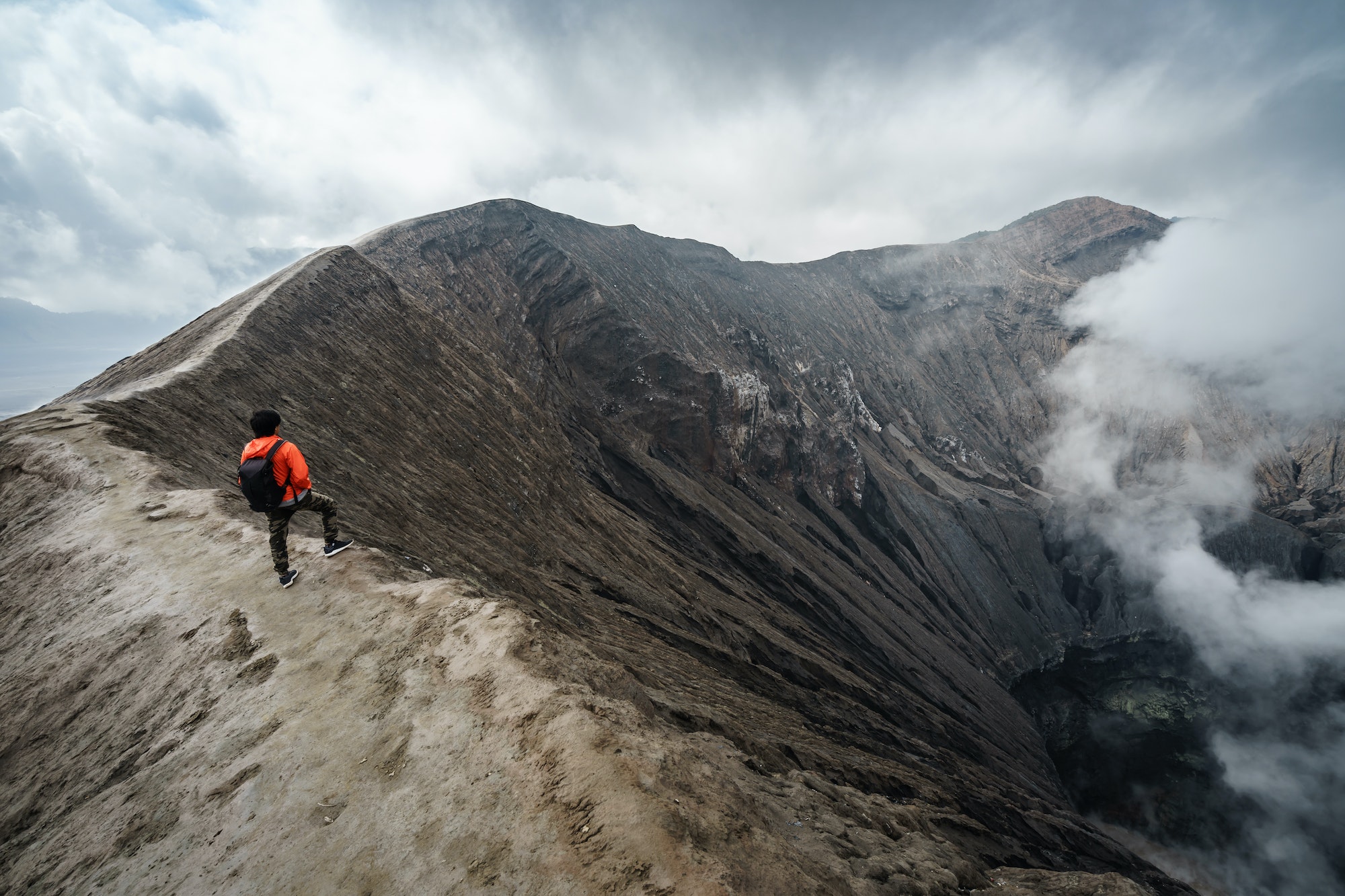 Traveler at crater volcano at Bromo (Gunung Bromo), Indonesia