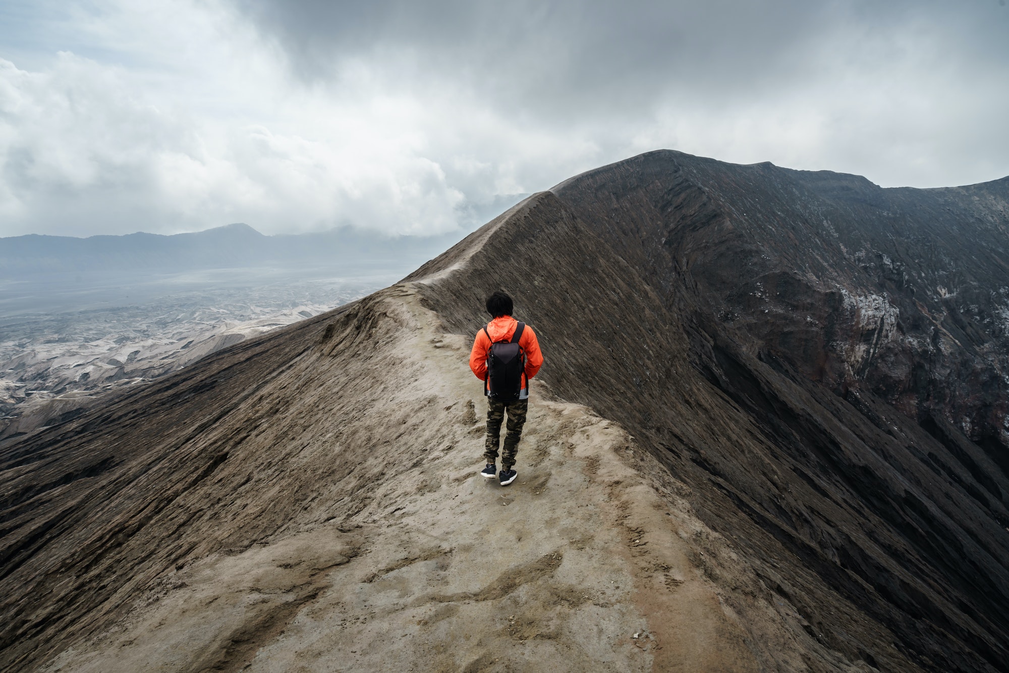 Traveler at crater volcano at Bromo (Gunung Bromo), Indonesia