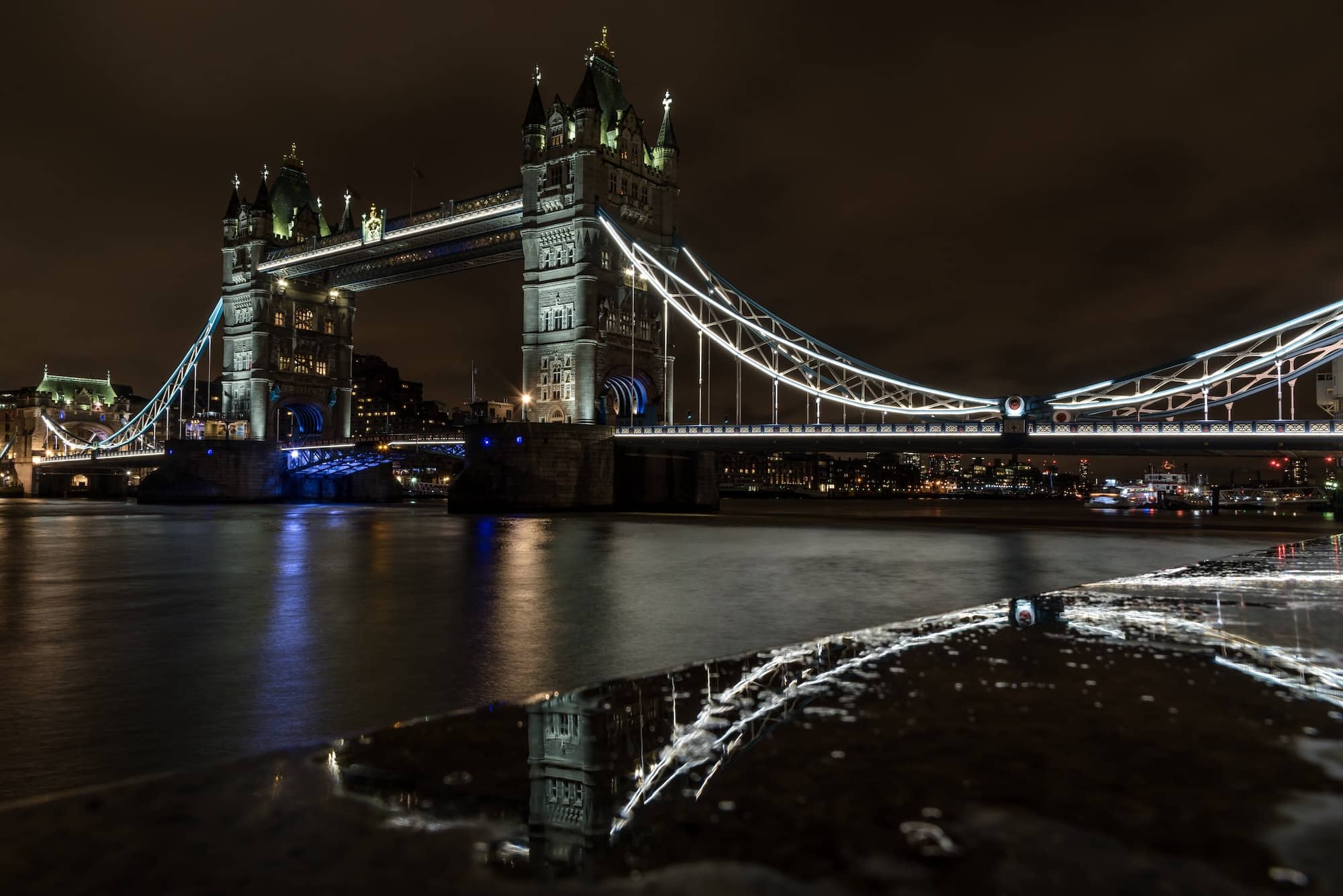 View of Tower Bridge and a tiny reflection of it in London.
