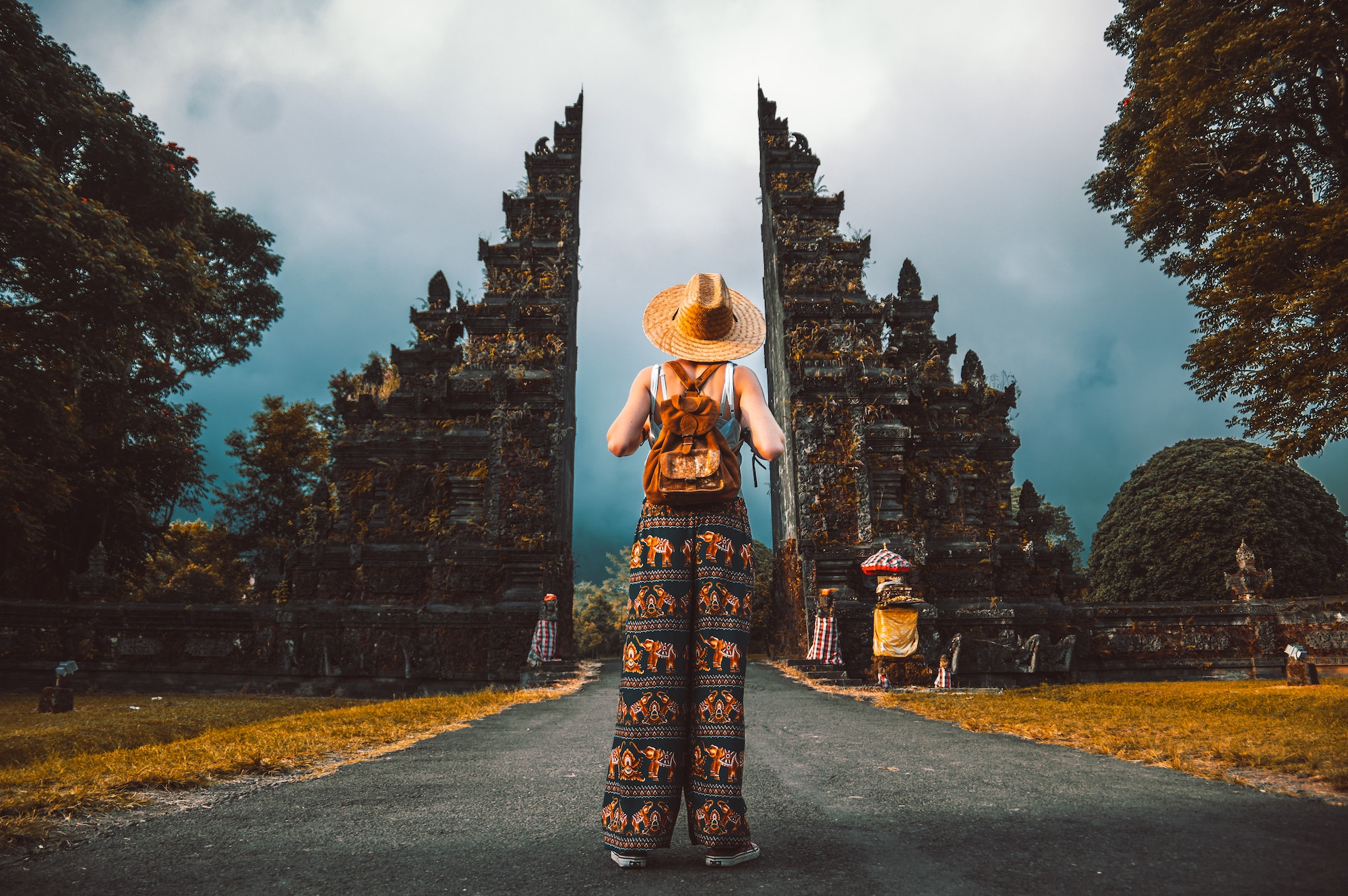 Woman with backpack exploring Bali, Indonesia.